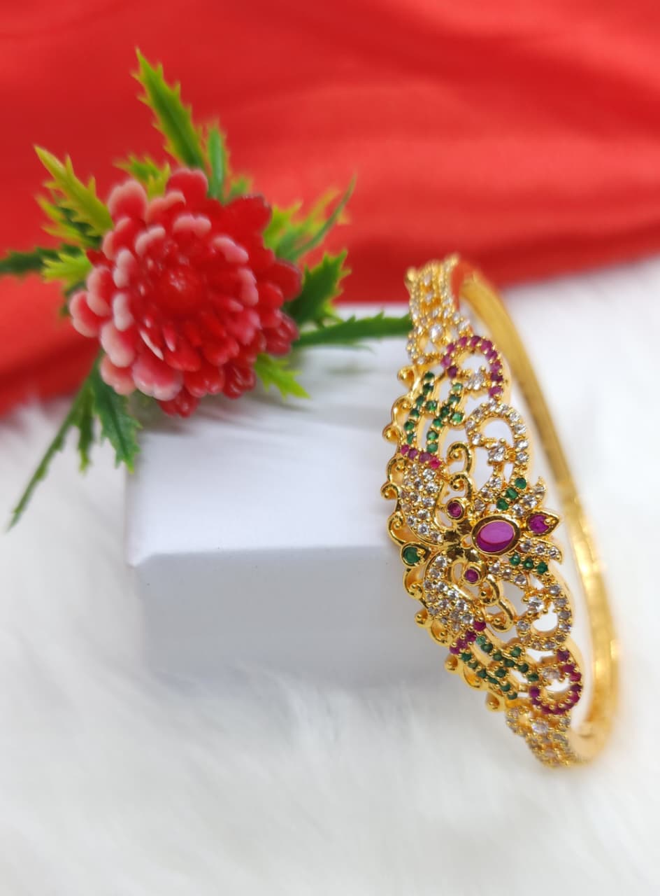 Designer Floral CZ and Ruby Green Stone Gold Finish Bangle – Premium Bridal & Festive Jewelry